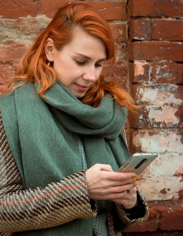 woman using mobile to submit online mortgage application for best low rate mortgage options in ireland